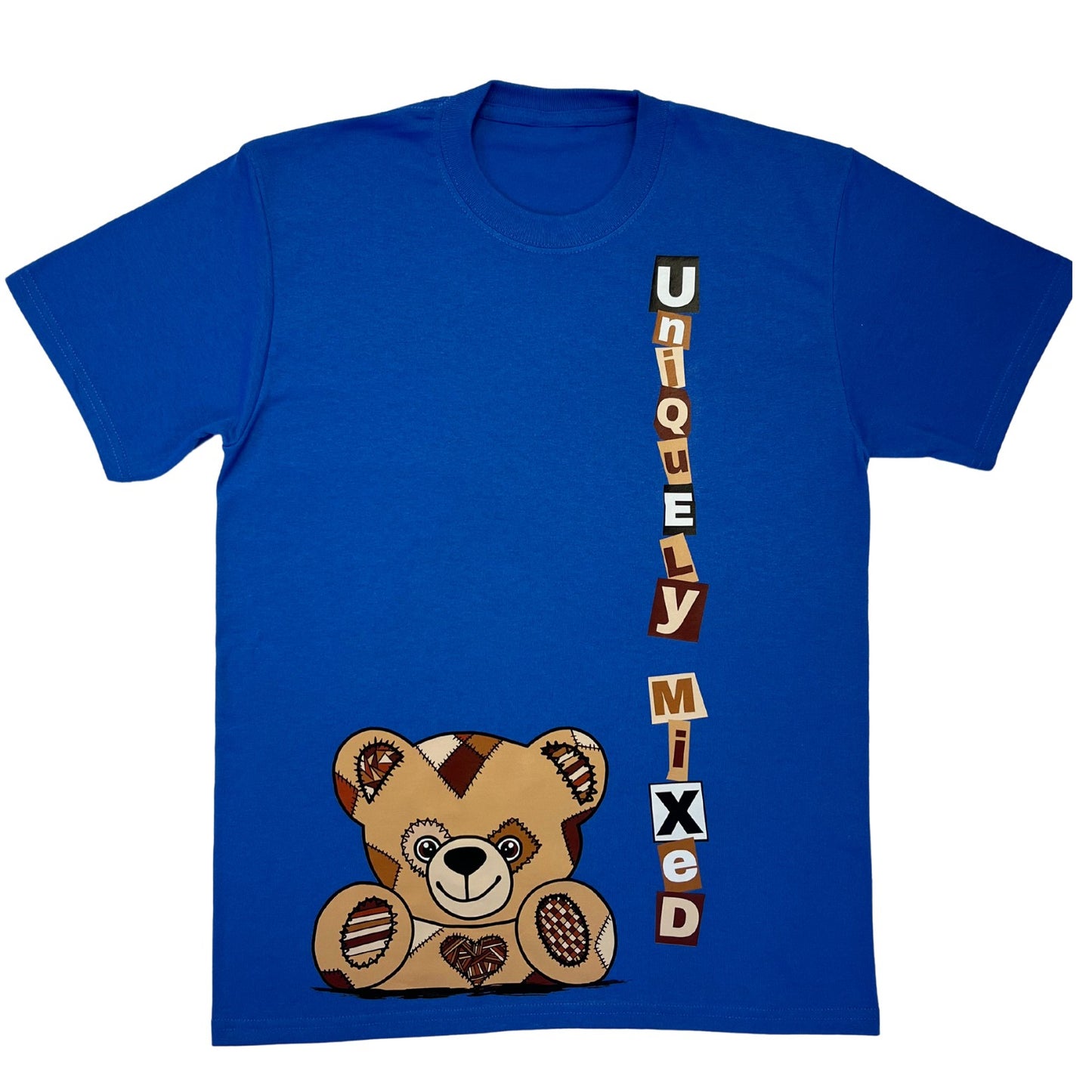 Blue t-shirt flat lay with a teddy bear graphic peeking up from the bottom of the t-shirt and 'Uniquely Mixed' text vertically on a white background.