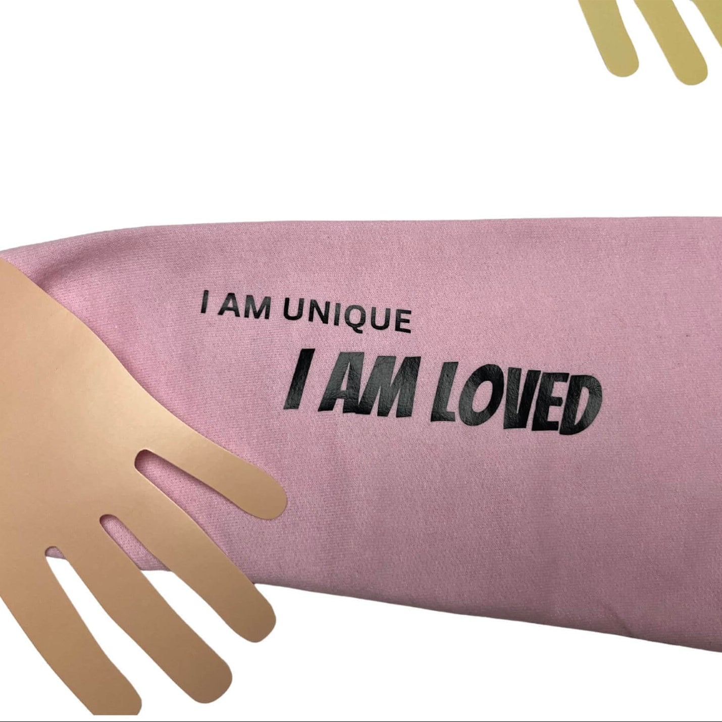 Pink Sleeve view of Uniquely Mixed Unity Bear hoodie with 'I AM UNIQUE I AM LOVED' text and a hand icon on a white background.